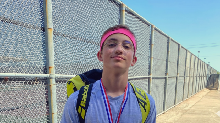 Teenage tennis player Oscar celebrating with a medal and tennis bag after winning a tournament in Sugar Land.